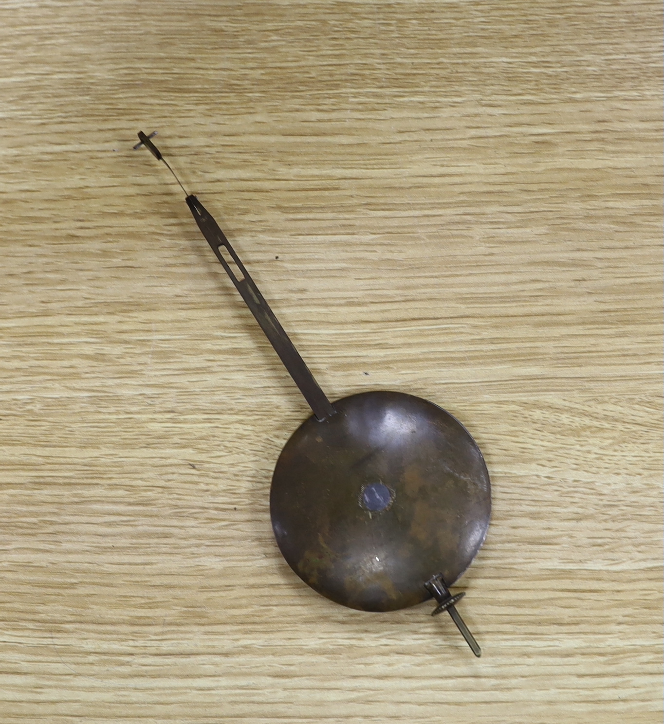 A Victorian mahogany wall clock, with pendulum, 34cm in diameter